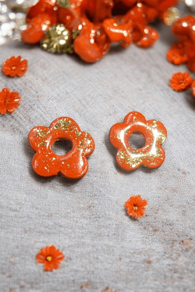 Pampilles interchangeables fleur orange vif et feuilles dorées pour créole 
