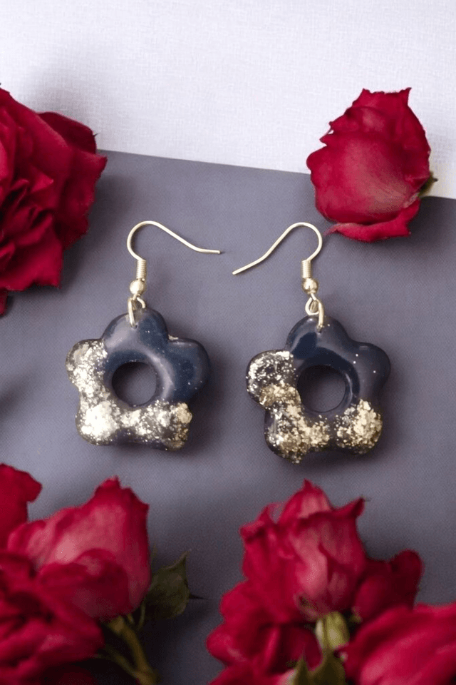 Boucles d&#039;oreilles en pâte polymère et finition en résine uv 